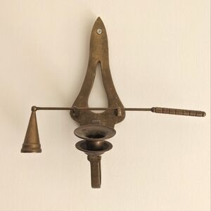 Vintage candle sconce with snuffer